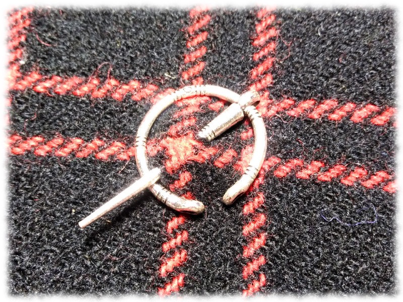 Broche pénannulaire : l'attache authentique pour tout viking aguerri.