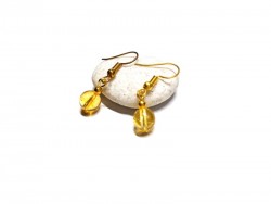 Avec mes boucles d'oreilles solaires en citrine véritable, je rayonne d'une joie contagieuse pour mon entourage.